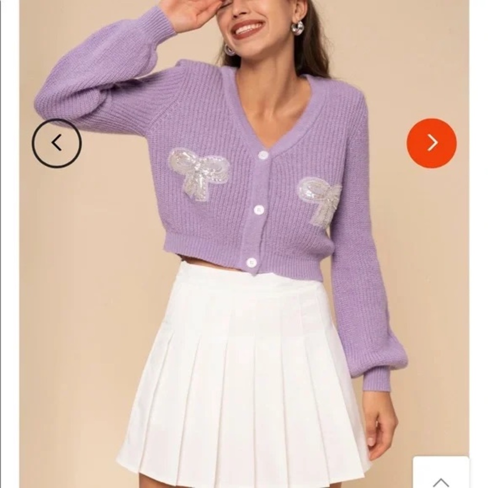 Purple cropped cardigan with bows